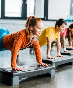 Children,Doing,Plank,Exercise,With,Step,Platforms
