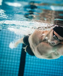 Fit,Swimmer,Training,In,The,Swimming,Pool.,Professional,Male,Swimmer